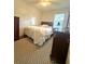 Bedroom with ceiling fan and laminate floors; great as room or in-law suite at 4745 Trout River Xing, Ellenton, FL 34222