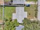 Bird's eye view of the home and surrounding neighborhood, highlighting the layout of the property at 4911 Bartelt Rd, Holiday, FL 34690