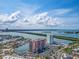 Breathtaking aerial view of the community with water views, tennis courts, marinas, and meticulously manicured landscaping at 51 Island Way # 800, Clearwater Beach, FL 33767