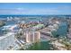 An expansive aerial view showcasing the community's waterfront location, city skyline, and surrounding waterways at 51 Island Way # 800, Clearwater Beach, FL 33767