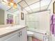 Clean bathroom with modern sink, toilet, and shower at 51 Island Way # 800, Clearwater Beach, FL 33767