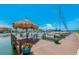 Picturesque dock with seating area offers lovely views of the waterfront and boats at 51 Island Way # 800, Clearwater Beach, FL 33767