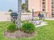 Community grilling area featuring well-maintained grills and charming picnic tables at 51 Island Way # 800, Clearwater Beach, FL 33767