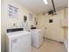 Community laundry room with modern washers and dryers at 51 Island Way # 800, Clearwater Beach, FL 33767