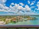 Wide waterfront view of a neighborhood with a clear sky at 51 Island Way # 800, Clearwater Beach, FL 33767