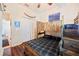 Bedroom featuring a bunk bed, wood floors, and a spacious closet, perfect for a room at 5102 Pheasant Woods Dr, Lutz, FL 33558