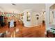 Spacious dining area with a brick wall, hardwood floors and decorative accents at 5102 Pheasant Woods Dr, Lutz, FL 33558