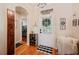 Inviting foyer with hardwood floors and views of the stairs and front door at 5102 Pheasant Woods Dr, Lutz, FL 33558