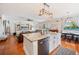 Island kitchen with a breakfast bar, stainless steel appliances, and a lake view at 5102 Pheasant Woods Dr, Lutz, FL 33558