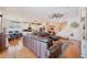 Open-concept living room seamlessly connects to the kitchen and dining area at 5102 Pheasant Woods Dr, Lutz, FL 33558