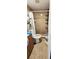 Bathroom featuring a tiled stand up shower with a white toilet at 5106 Town N Country Blvd, Tampa, FL 33615