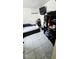 Bedroom featuring a TV, wardrobe and double bed at 5106 Town N Country Blvd, Tampa, FL 33615