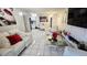 Bright living room with modern decor and tile flooring at 5106 Town N Country Blvd, Tampa, FL 33615