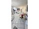 Bright living room with modern decor and tile flooring at 5106 Town N Country Blvd, Tampa, FL 33615