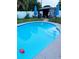 This in-ground pool has clear water, a gazebo nearby, and ample space for fun and relaxation at 5106 Town N Country Blvd, Tampa, FL 33615