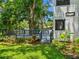 Charming backyard with a deck and lush landscaping, perfect for outdoor relaxation and enjoyment at 5518 21St S Ave, Gulfport, FL 33707