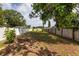 The expansive backyard is partially shaded by mature trees at 5519 Kelly N Dr, St Petersburg, FL 33703