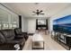 Living room featuring tile floors, a ceiling fan, and natural light at 5519 Kelly N Dr, St Petersburg, FL 33703