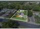Home featuring a well-maintained lawn and a fenced backyard in a neighborhood at 5651 6Th St, Zephyrhills, FL 33542