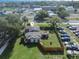 A residence featuring solar panels, a yard, and nearby parking at 5651 6Th St, Zephyrhills, FL 33542