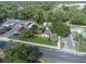 Aerial view highlighting property location, fenced yard, and neighborhood at 5651 6Th St, Zephyrhills, FL 33542