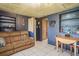 Inviting living room featuring built-in shelving and neutral tones at 5651 6Th St, Zephyrhills, FL 33542