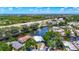 Charming waterfront community with a beautiful canal running through it, surrounded by lush greenery and blue skies at 5806 Portsmouth Dr, Tampa, FL 33615