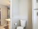 The bathroom features vanity with mirror and leads into the separate toilet area at 5806 Portsmouth Dr, Tampa, FL 33615