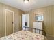 Comfortable bedroom with a cozy bed, closet space, and natural light from the window at 5806 Portsmouth Dr, Tampa, FL 33615