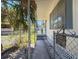 Front entrance to house with covered porch and walkway with fence at 5806 Portsmouth Dr, Tampa, FL 33615