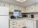Well-equipped kitchen features ample counter space, and plenty of cabinet storage at 5806 Portsmouth Dr, Tampa, FL 33615