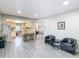 Open-concept living area connecting the kitchen, dining, and lounge spaces at 5806 Portsmouth Dr, Tampa, FL 33615