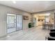 Open-concept living area connecting the kitchen, dining, and lounge spaces at 5806 Portsmouth Dr, Tampa, FL 33615