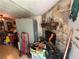 A living room with a stone fireplace and vintage decor accents at 5853 39Th St N, St Petersburg, FL 33714