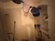 Shower with shower head and built-in shelving featuring various bath and hygiene products at 5853 39Th St N, St Petersburg, FL 33714
