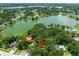 Property location with an aerial view, showcasing proximity to a large lake and surrounding neighborhood at 616 Pawn Way, Seffner, FL 33584