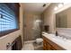 Bathroom featuring tile floors, vanity, and a glass enclosed walk in shower at 616 Pawn Way, Seffner, FL 33584