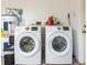 Laundry room featuring new, front loading Samsung washer and dryer set at 616 Pawn Way, Seffner, FL 33584