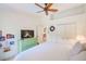 Bedroom with ceiling fan, closet, and natural light at 6250 Fairskies Dr, New Port Richey, FL 34655