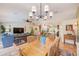 Open concept dining area with view to the living room and kitchen at 6250 Fairskies Dr, New Port Richey, FL 34655