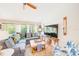 Bright living room with large windows and stylish decor at 6250 Fairskies Dr, New Port Richey, FL 34655