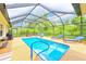 Enjoy this sparkling pool inside a screened lanai with room for lounging at 6250 Fairskies Dr, New Port Richey, FL 34655