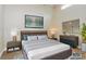 Comfortable bedroom featuring stylish furnishings, calming decor, and plenty of natural light at 6263 93Rd N Ter # 4202, Pinellas Park, FL 33782