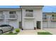 Charming two-story townhome features a private balcony, attached garage, and well-manicured lawn at 6263 93Rd N Ter # 4202, Pinellas Park, FL 33782