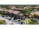 An aerial view of complex and surrounding landscape, showcasing the community and parking at 6338 Newtown Cir # 38A6, Tampa, FL 33615