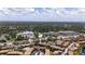 This aerial view showcases surrounding area, highlighting the property's location and amenities at 6338 Newtown Cir # 38A6, Tampa, FL 33615