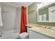 Bathroom showcasing the shower, toilet, sink, and vanity with mirror at 6338 Newtown Cir # 38A6, Tampa, FL 33615
