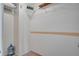 Empty closet with wire shelving and a wood strip accent on the wall at 6338 Newtown Cir # 38A6, Tampa, FL 33615