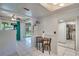 Eat in kitchen with tiled floors, casual dining area, and view to an outdoor patio at 6338 Newtown Cir # 38A6, Tampa, FL 33615