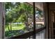 View from a patio of the community pool and grassy area at 6338 Newtown Cir # 38A6, Tampa, FL 33615